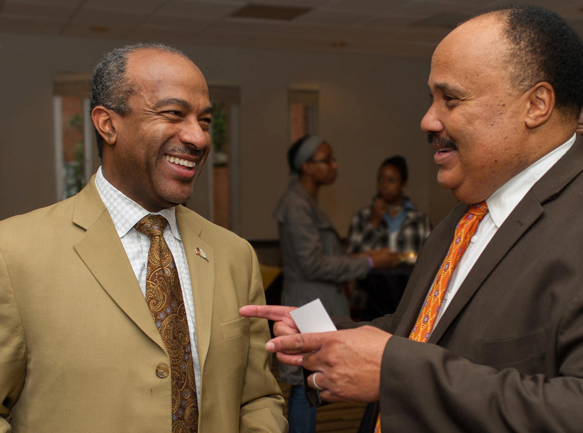 Gary S. May and Martin Luther King III, chatting