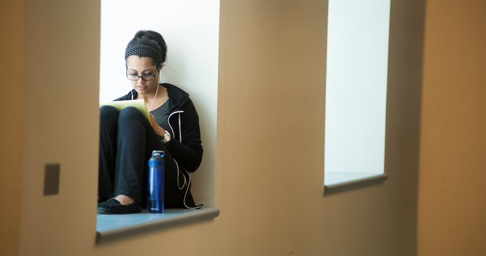 Caption/Description: UC Davis student studies on the second floor of Shields Library.