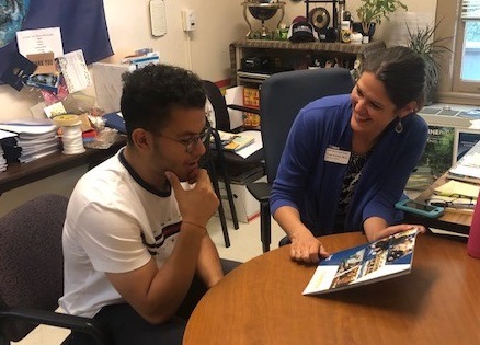 Hesham Ahmed is a senior transfer student studying Managerial Economics. He is also a Reception Intake Intern at the Internship and Career Center.  Here he is talking with Lynn Fowler, Senior Career Advisor about the Career Resource Manual.  Picture by Adriane Boykin, ICC, UCD.