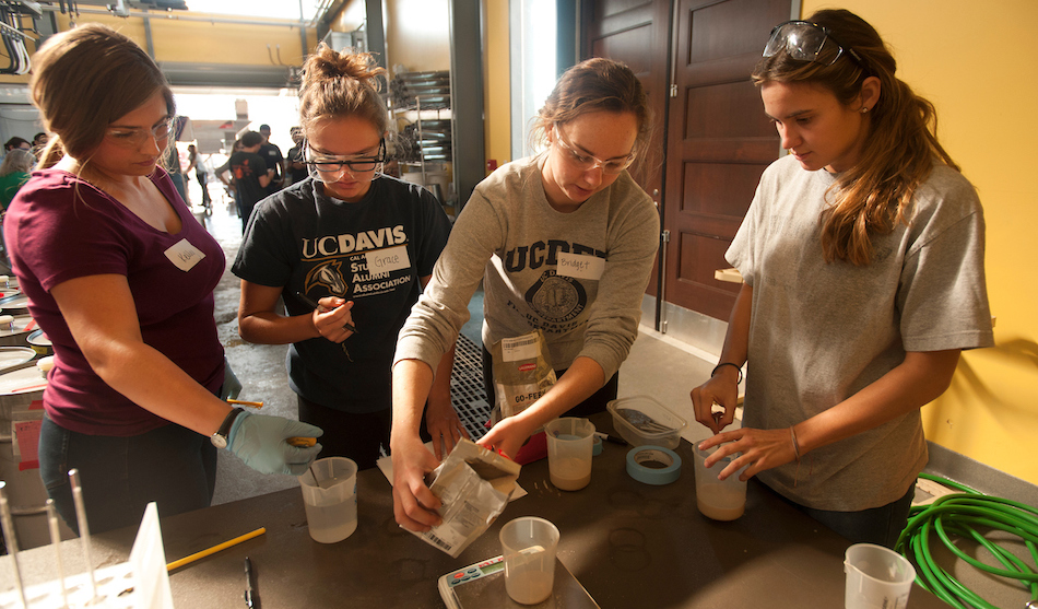 (l to r) Kelly Gifford, Grace Sayre, Bridget McLoughlin (Viticulture and Enoloy majors) and Jill Bilodeaux, a biotechnology major, work to record and make their varied yeast mixtures during grape crush class in the winery at Robert Mondavi Institute on September 30, 2016 at UC Davis.  The goal of the class is to give students practical experience  in winemakeing on a small scale so that they can make errors on a small scale.