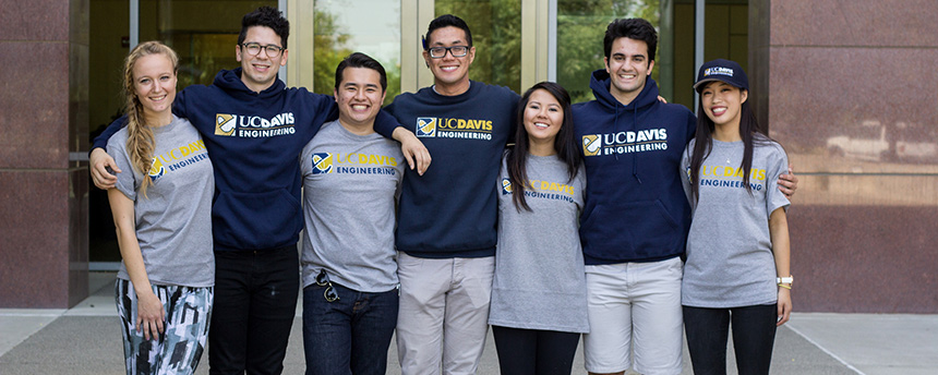 Several students in engineering T-shirts arm in arm