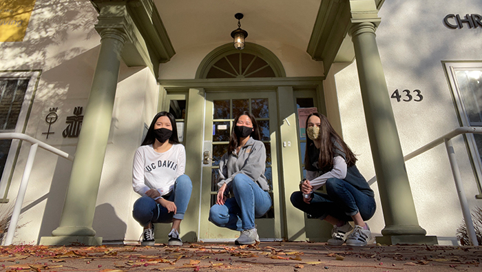 Aggie House co-founders pictured in front of the house