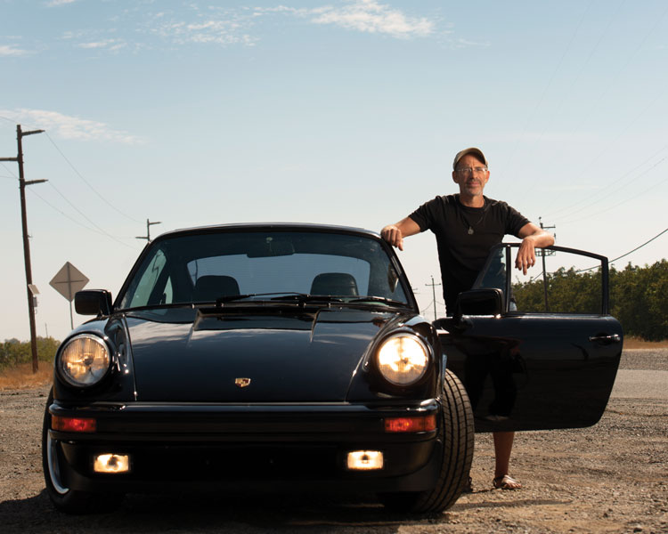 Kurt Kornbluth with a car he restored