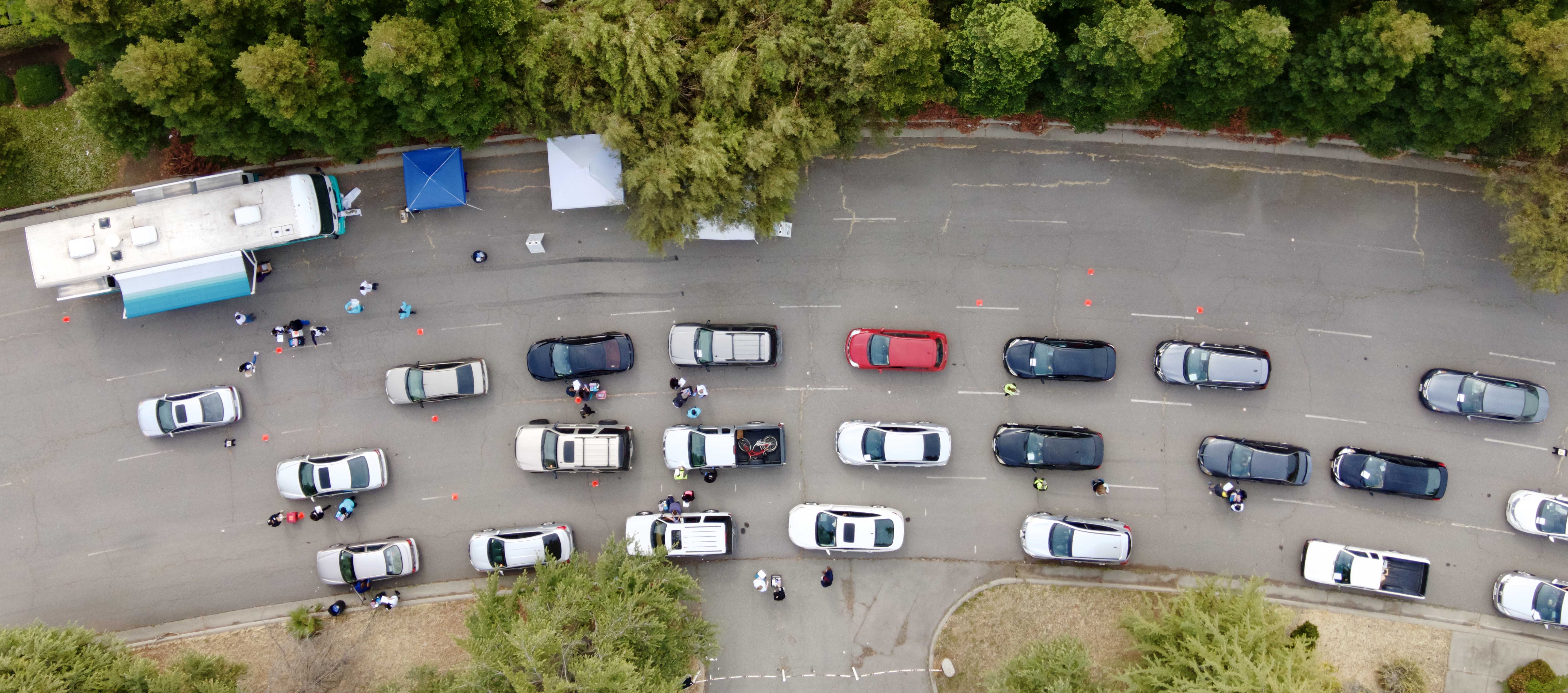 An aerial shot of cars lined