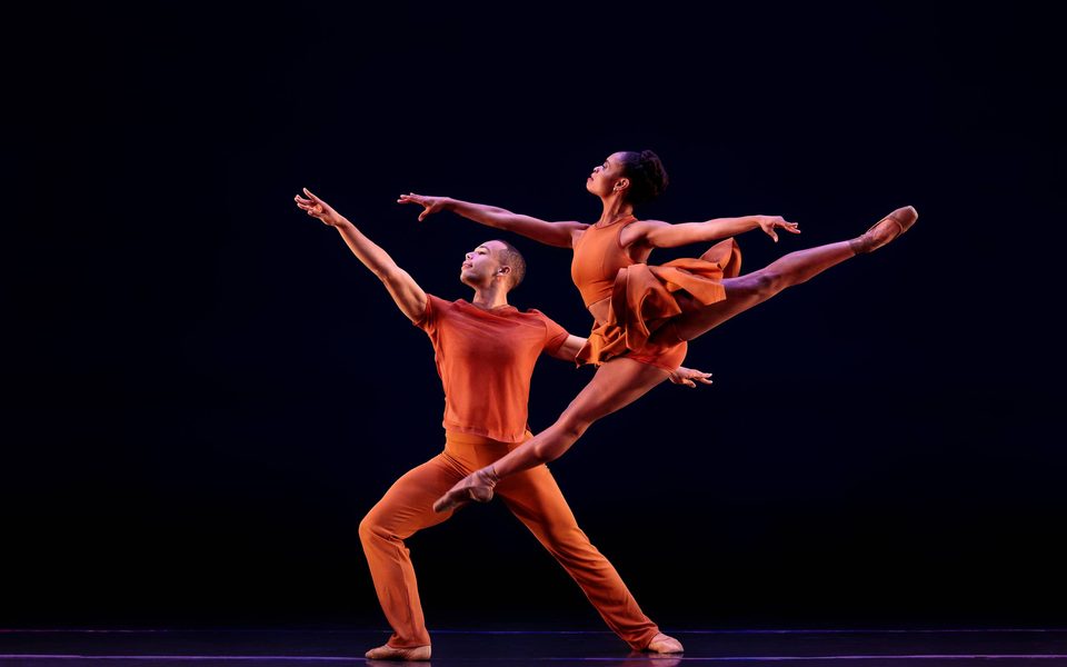dancers in orange