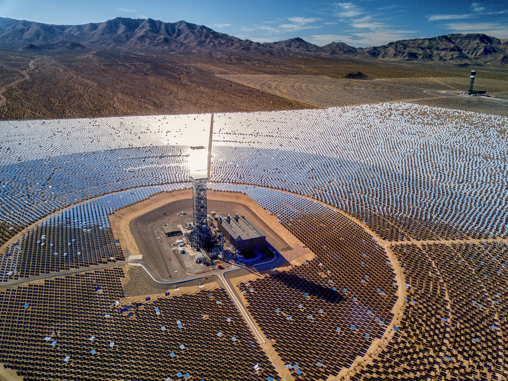 Aerial of large solar thermal energy plant in Mojave Desert
