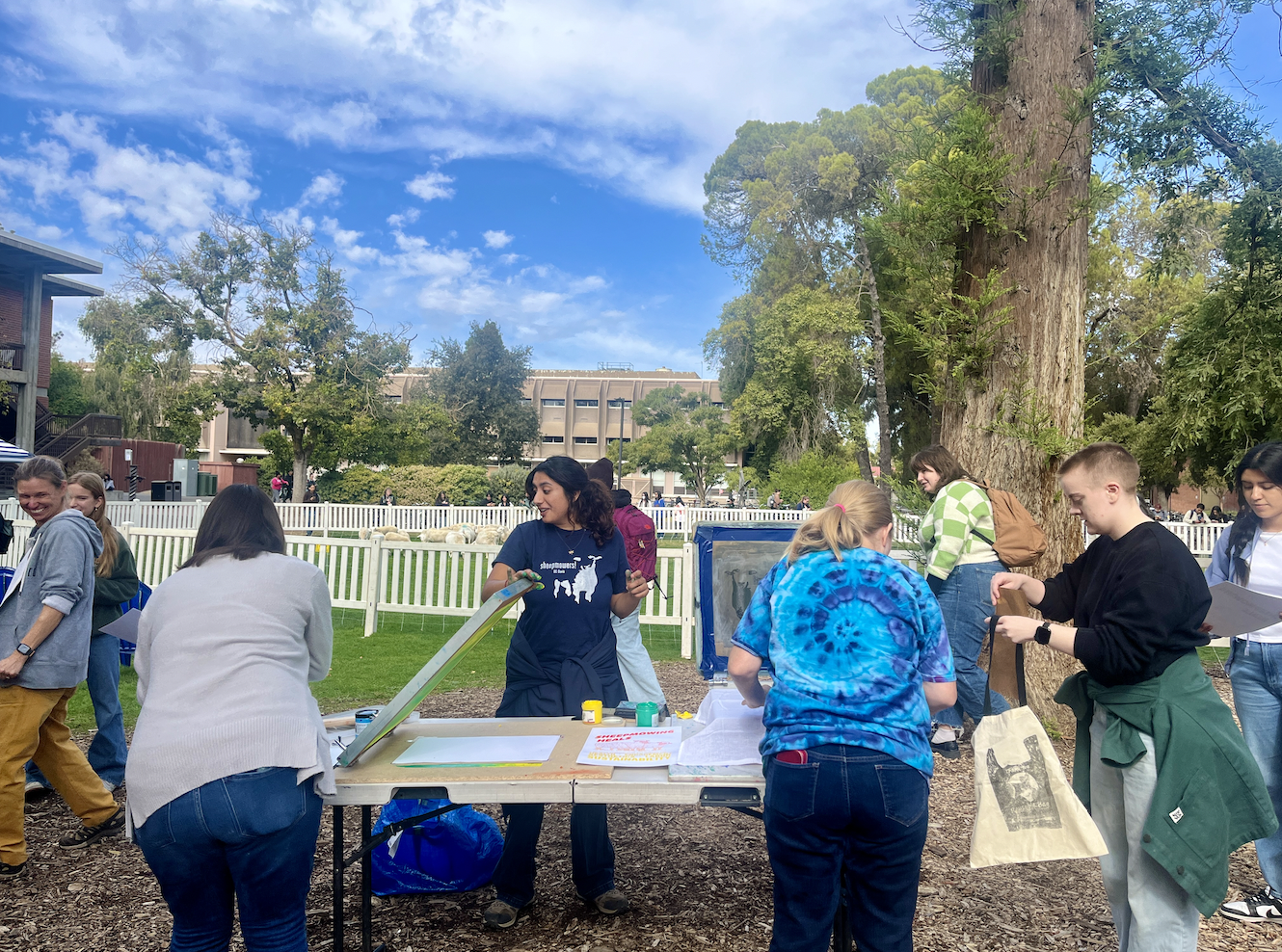 Screenprinting demonstration outside of Wellman Hall next to the Sheepmowers. (Jamie Gelfond/ Photography)