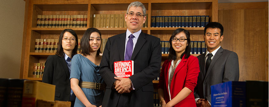 four students pose for a portrait of Hong Yen Chang as part of the Asian Pacific American Law Students Association