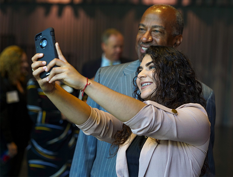 Student takes selfie with Chancellor May