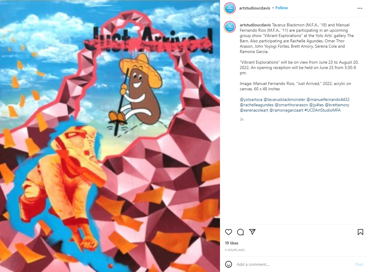 An Instagram post by artstudioucdavis depicts Manuel Fernando Rios's "Just Arrived" featuring a brown cartoon in front of a textured pink design and blue sky. The words "Just Arrived" are crossed out in pink at the top of the art.