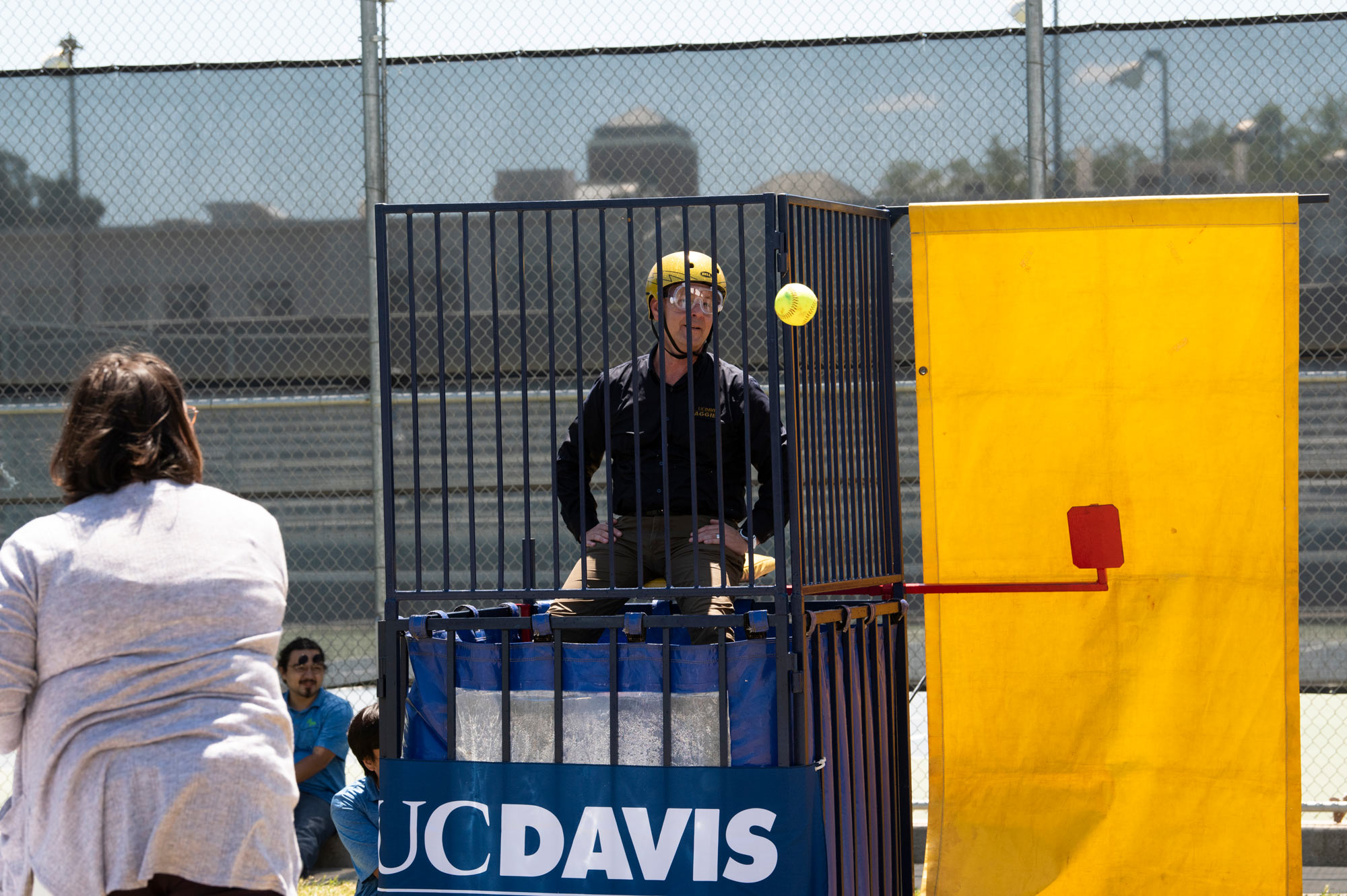 TGFS picknicker thows ball at dunk tank target