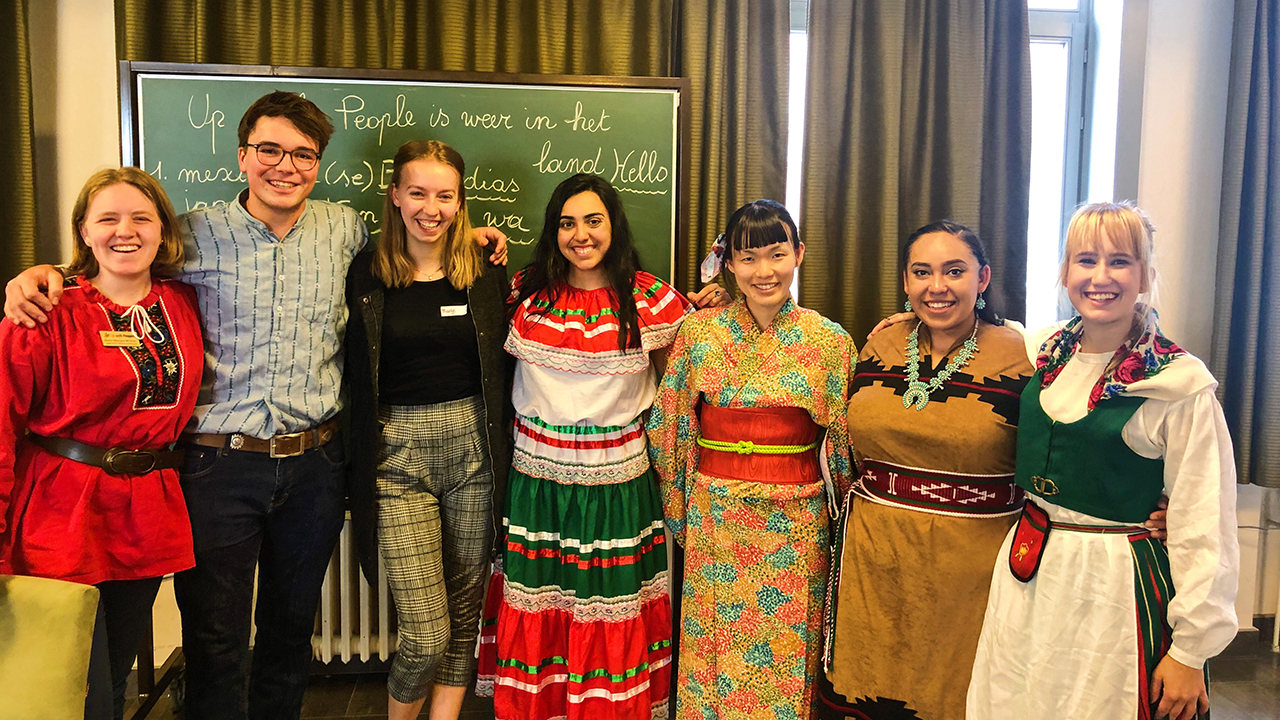 Students post at a cultural workshop at a nursing home in Belgium on UC Davis study abroad