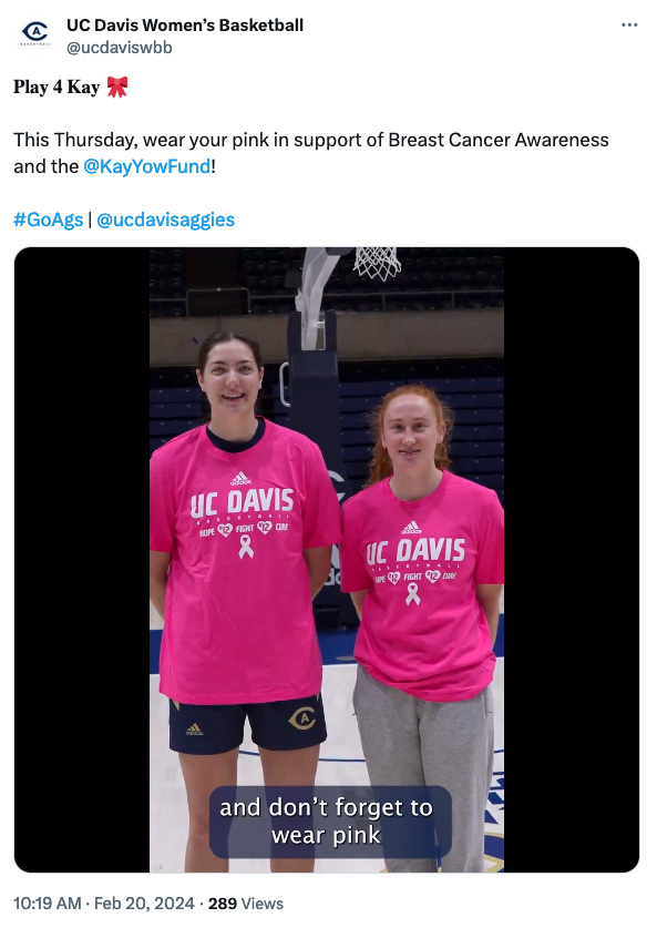 Tweet from UC Davis women’s basketball team shows two students wearing pink shirts. Tweet text says: 𝐏𝐥𝐚𝐲 𝟒 𝐊𝐚𝐲 🎀  This Thursday, wear your pink in support of Breast Cancer Awareness and the @KayYowFund !  #GoAgs | @ucdavisaggies. Caption on video says: "and don't forget to wear pink"