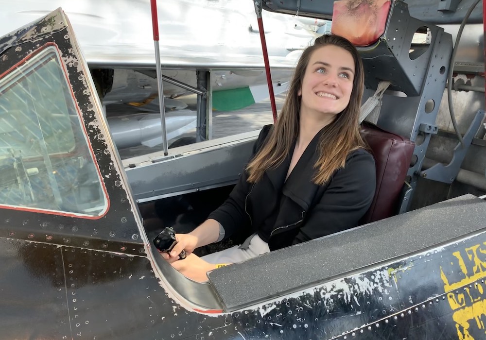 Bethany Baldwin-Pulcini sits in the cockpit of a plane. (Photo courtesy)
