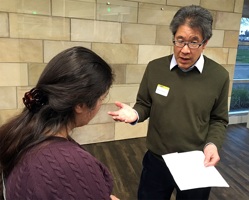 Wesley Young speaks to a student.