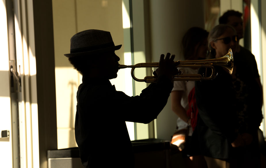 Trumpeter in silhouette