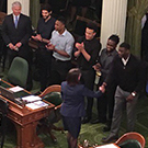 Basketball players meet state lawmakers.