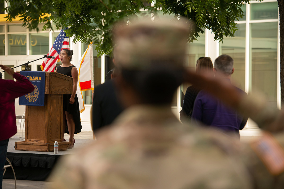 Nicole Chin sings the national anthem at UC Davis' Memorial Day Ceremony.