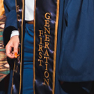 A stole reading "first generation"