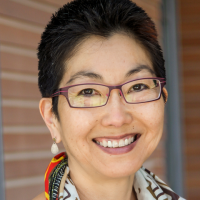 A close-up portrait of Lisa Ikemoto