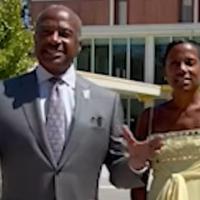 Chancellor Gary May and LeShelle standing in front of the Memorial Union