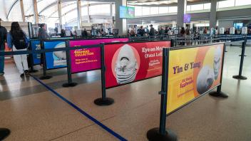 Multi-colored line dividers showcase the Eggheads at the Sacramento Airport.