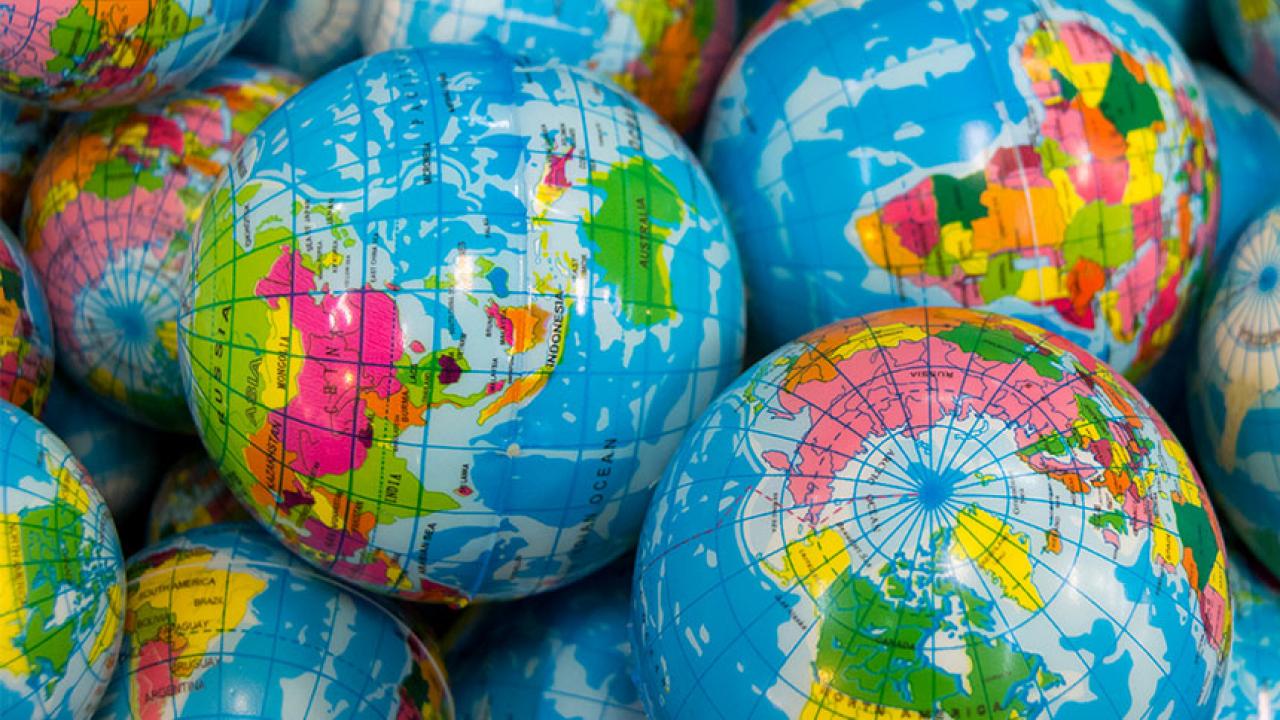 A jumble of small toy globes
