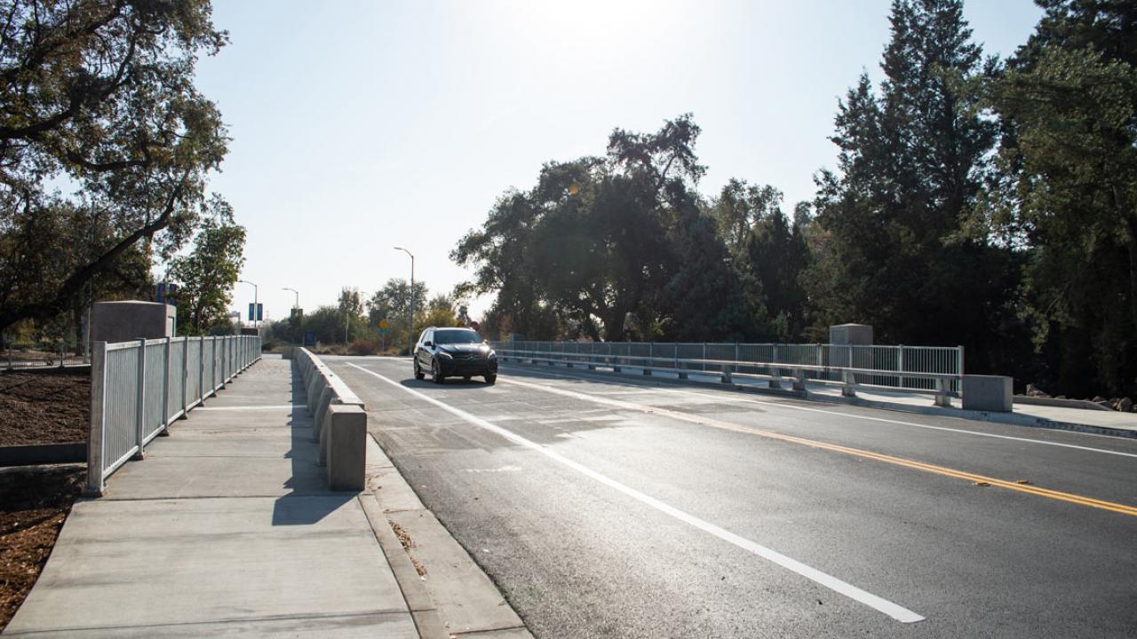 New bridge showing extra width for bike lanes and full-width sidewalks.