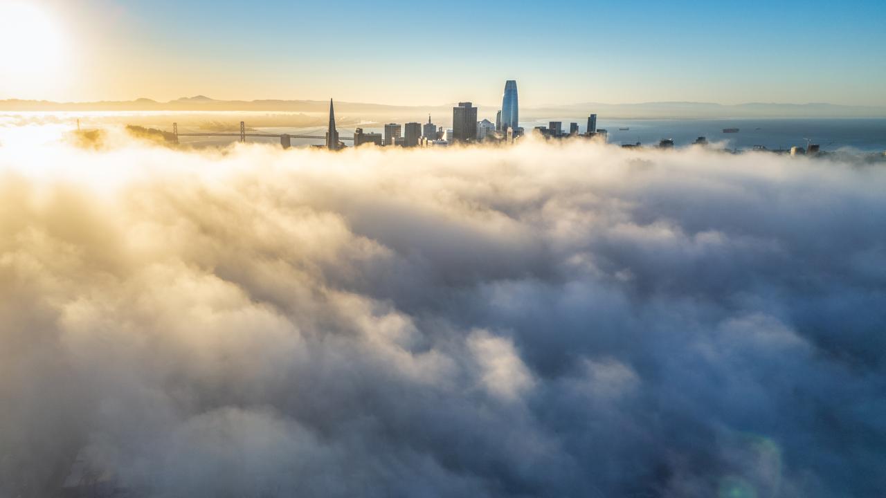 Clouds hover over San Francisco, with skyline peeking through