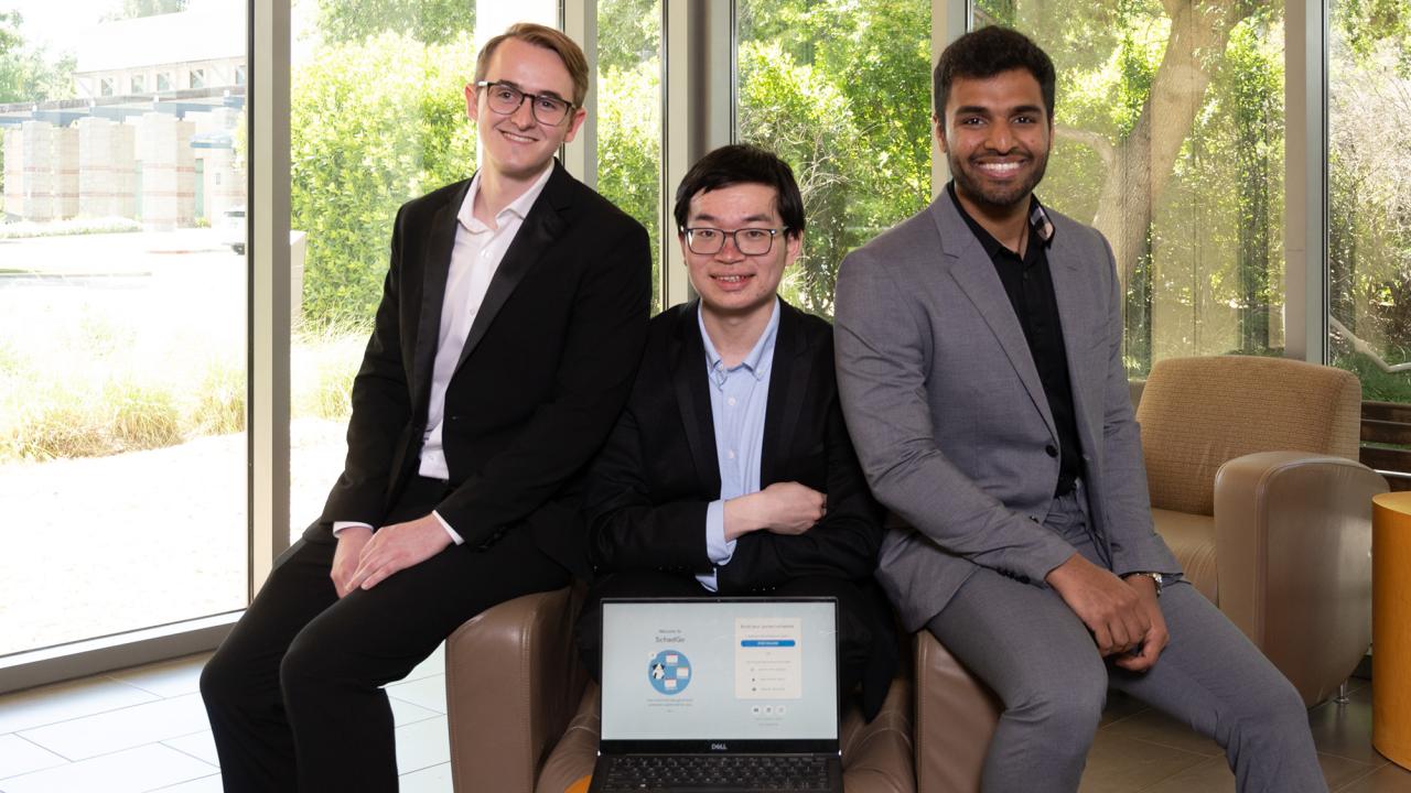 Three young men in suits are UC Davis Big Bang winning team
