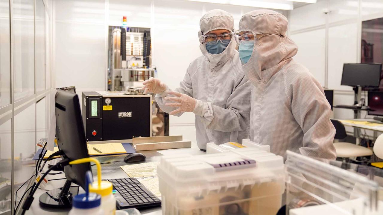 Two researchers in clean room lab