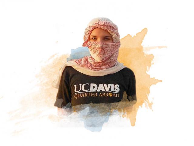 A female UC Davis student poses with a head scarf in Egypt