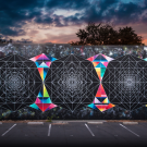 A mural featuring geometric shapes, both colorful and black-and-white.