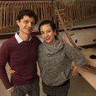 Music Professor Juan Diego D&iacute;az and his wife, Yerina Rock, are pictured in a music room.