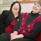 Shirley Sperry, left, and Karen Faithorn share a couch in the Re-entry Student Services lounge. Sperry is the coordinator for the Re-entry Student Services unit, and Faithorn is a former re-entry student who works at the Cowell Student Health Ce