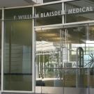 "F. William Blaisdell Medical Library" sign above glass entry doors