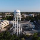 Aerial view of campus, including water tower