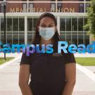 Woman wearing face covering with text "Campus Ready"