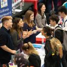 Students talk with employers at career fair