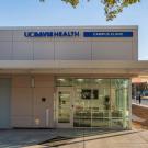 One-story building with sign: "UC Davis Health Campus Clinic"