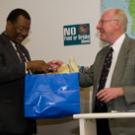 Chancellor Larry Vanderhoef, right, visited the Internship and Career Center on April 12 to present an award to Les McBee, diplomat  in residence from the U.S. State Department.