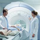 Stock photo of patient being prepared for MRI scanning. 