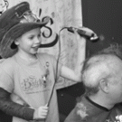 Francesca Arnaudo, left, a UC Davis patient who twice beat cancer and is alive today, shaved the head of Ted Zwerdling, an associate professor of pediatrics, at the 2005 St. Baldrick&rsquo;s  fundraising event. It was Arnaudo&rsquo;s idea to shave her h