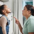 Latina mother has stressed discussion with child.