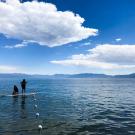 Children on paddle board in Lake Tahoe 