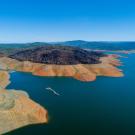Aerial view of Lake Oroville at half its water capacity for month of May, with water line