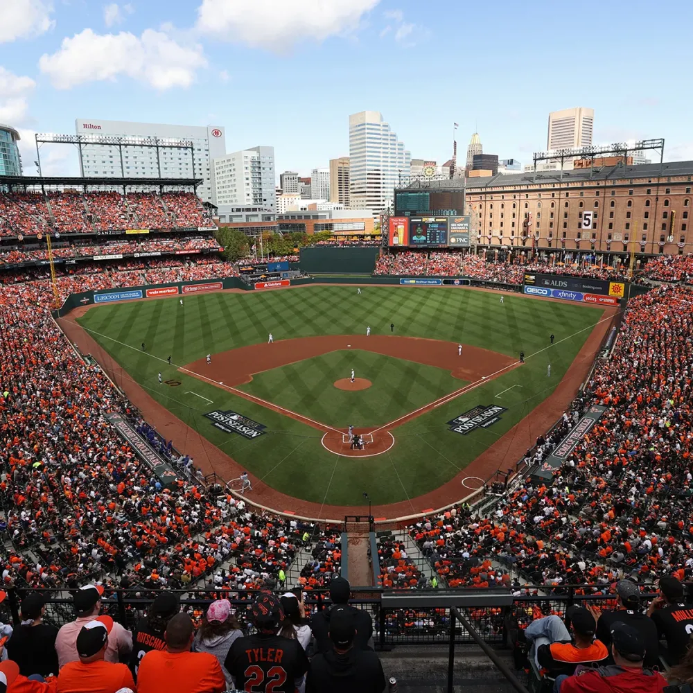 Wide-angle photo from high up behind home plate at Oriole Park during a sold out playoff game.