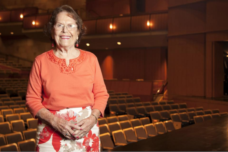 A photo of Barbara K. Jackson standing in the Mondavi Center's Jackson Hall.