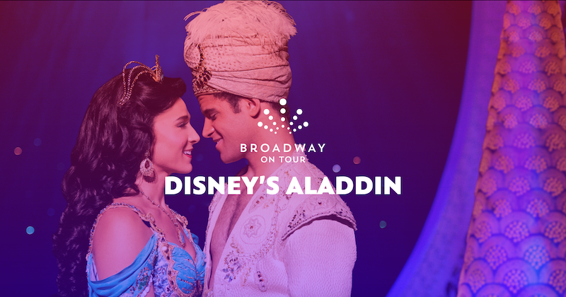 A promotional photo showing Aladdin and Jasmine facing each other.