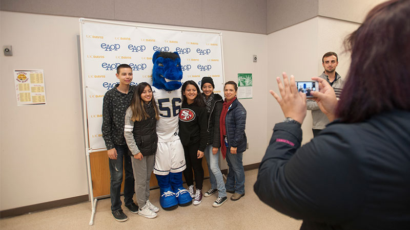 Students pose for a photo with Gunrock